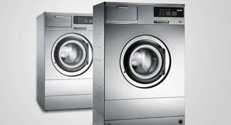Bild einer Waschmaschine, in der Schallschutz-Matten eingesetzt werden.